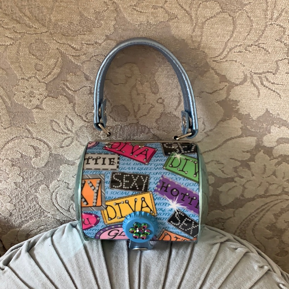 Prezzo round , metal blue diva design handbag  never used , smoke free home